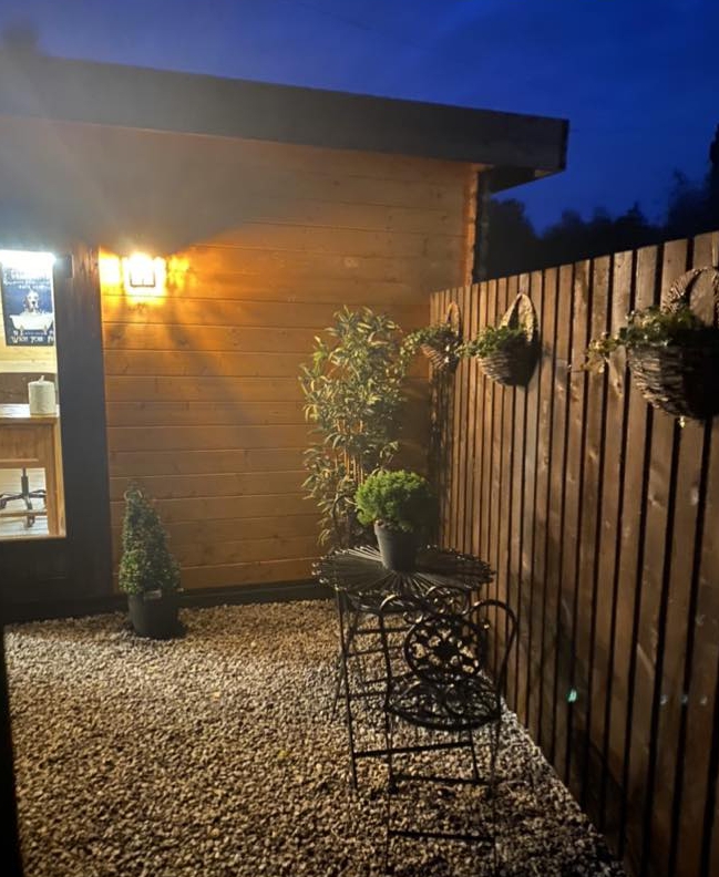 I hate my neighbour’s back garden cabin – she put it up without planning permission… but council is taking her side