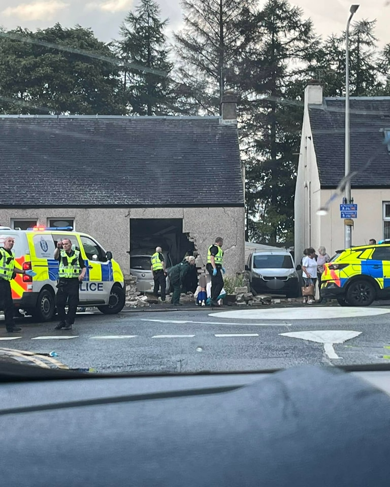 Car smashes through Scots home in horror crash as emergency crews race to scene