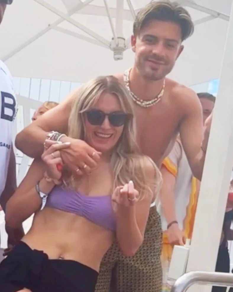 Man City star Jack Grealish scores a hat-trick as he cosies up to third woman on holiday after winning Champions League