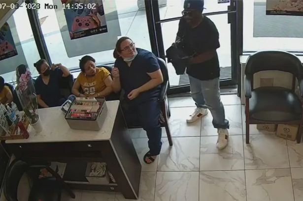 Robber leaves after failing to steal from nail salon as workers ignore him