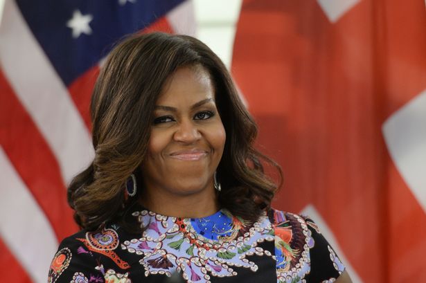 Michelle Obama ‘brought Harry and Meghan together but wasn’t allowed at wedding’