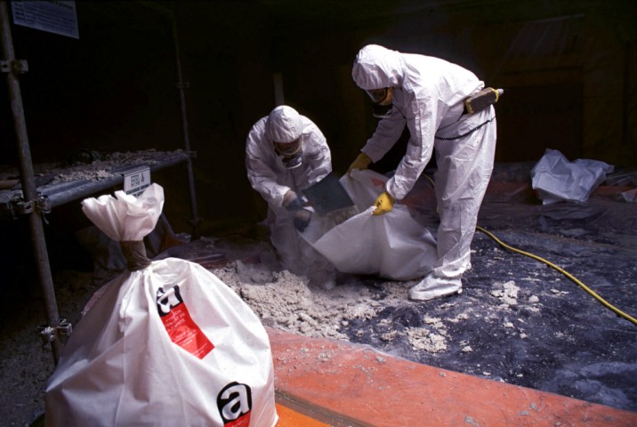 What is asbestos and when was it banned in the UK?
