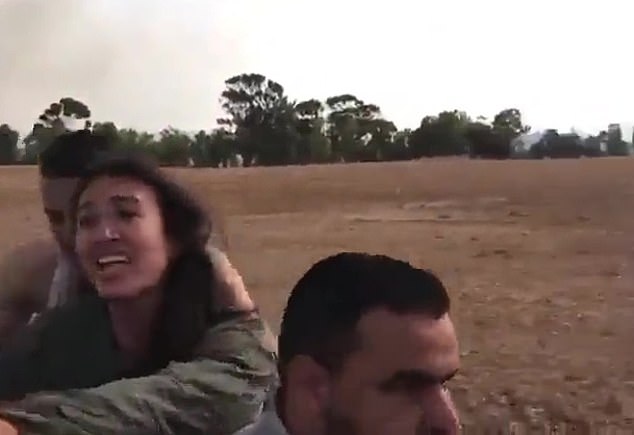 Harrowing moment Israeli student begs ‘Don’t kill me’ as she’s snatched from a music festival by Hamas terrorists