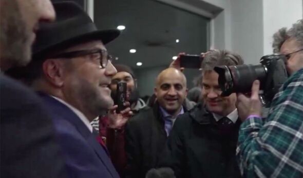 ‘Cry more!’ Jubilant George Galloway mocks BBC reporter after Rochdale victory – video