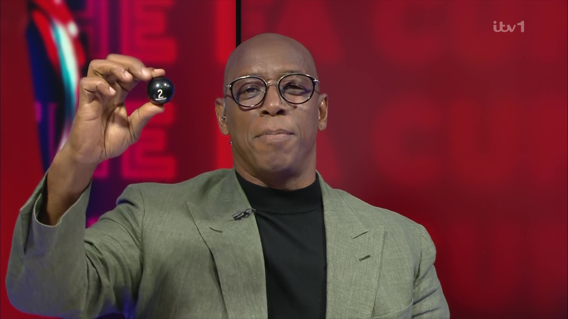 Ian Wright ‘goes full Rod Stewart’ in FA Cup draw… before chucking away ball bag live on TV and making Roy Keane laugh