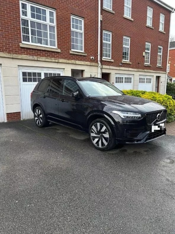 Shocking moment stranger brazenly parks black Volvo on private driveway & walks away – only returning 12 HOURS later