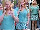Amy Schumer looks thinner in a T-shirt and mini skirt while filming Kinda Pregnant in NYC… after revealing Cushing Syndrome caused bloating
