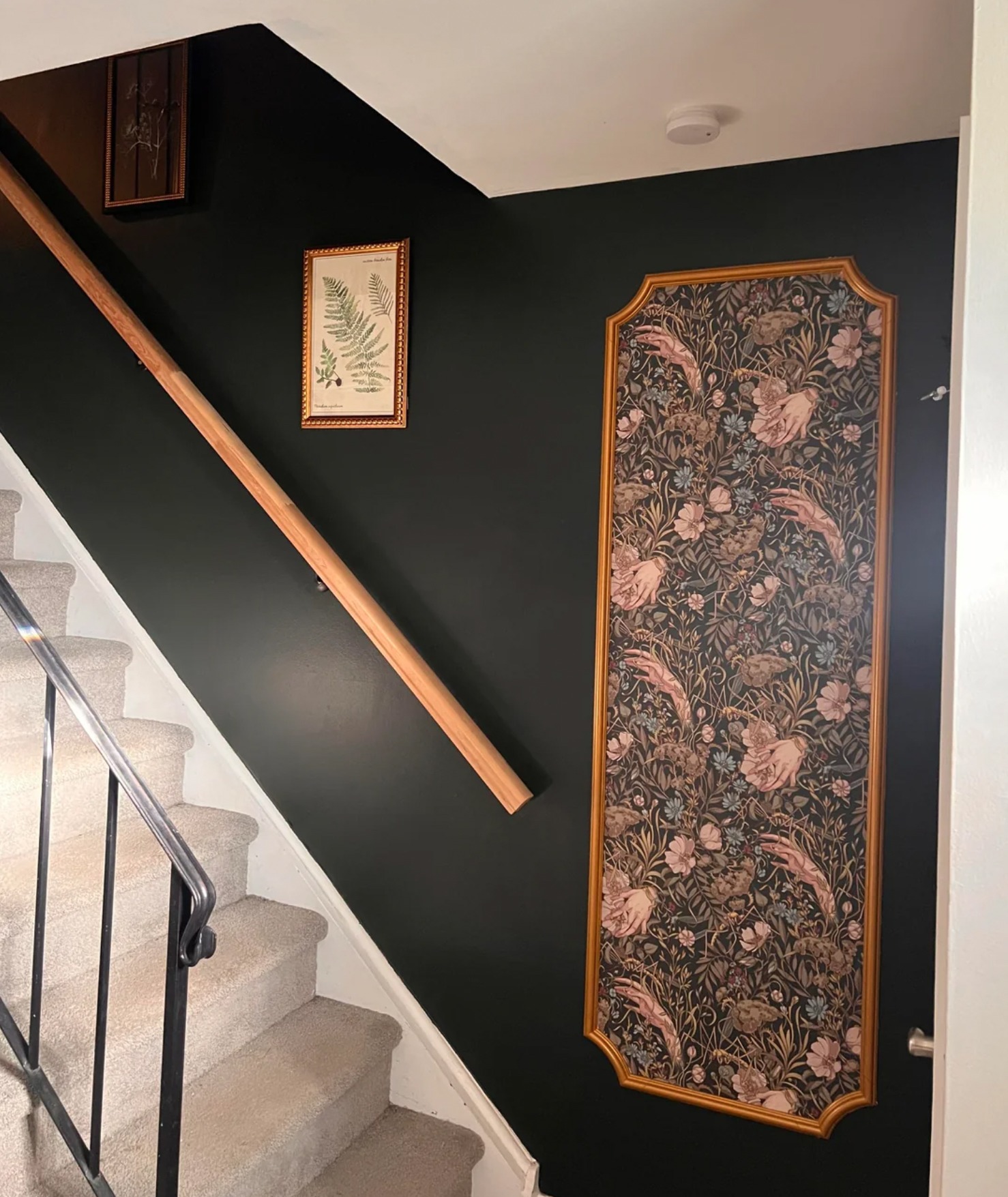I transformed my stairway with my DIY framed murals – they were super simple to make, all you need are wallpaper & caulk