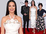 Katy Perry dazzles in chic white ensemble alongside her parents on the red carpet at 35th Annual Colleagues Spring Luncheon in Beverly Hills
