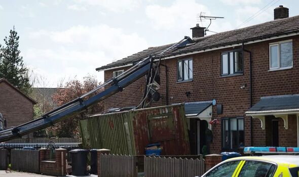 Watch terrifying moment crane collapses ‘slicing through house’ nearly crushing a child