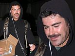 Zac Efron changes his look up with a mustache while going casual in a black hoodie as he leaves the Chateau Marmont in West Hollywood