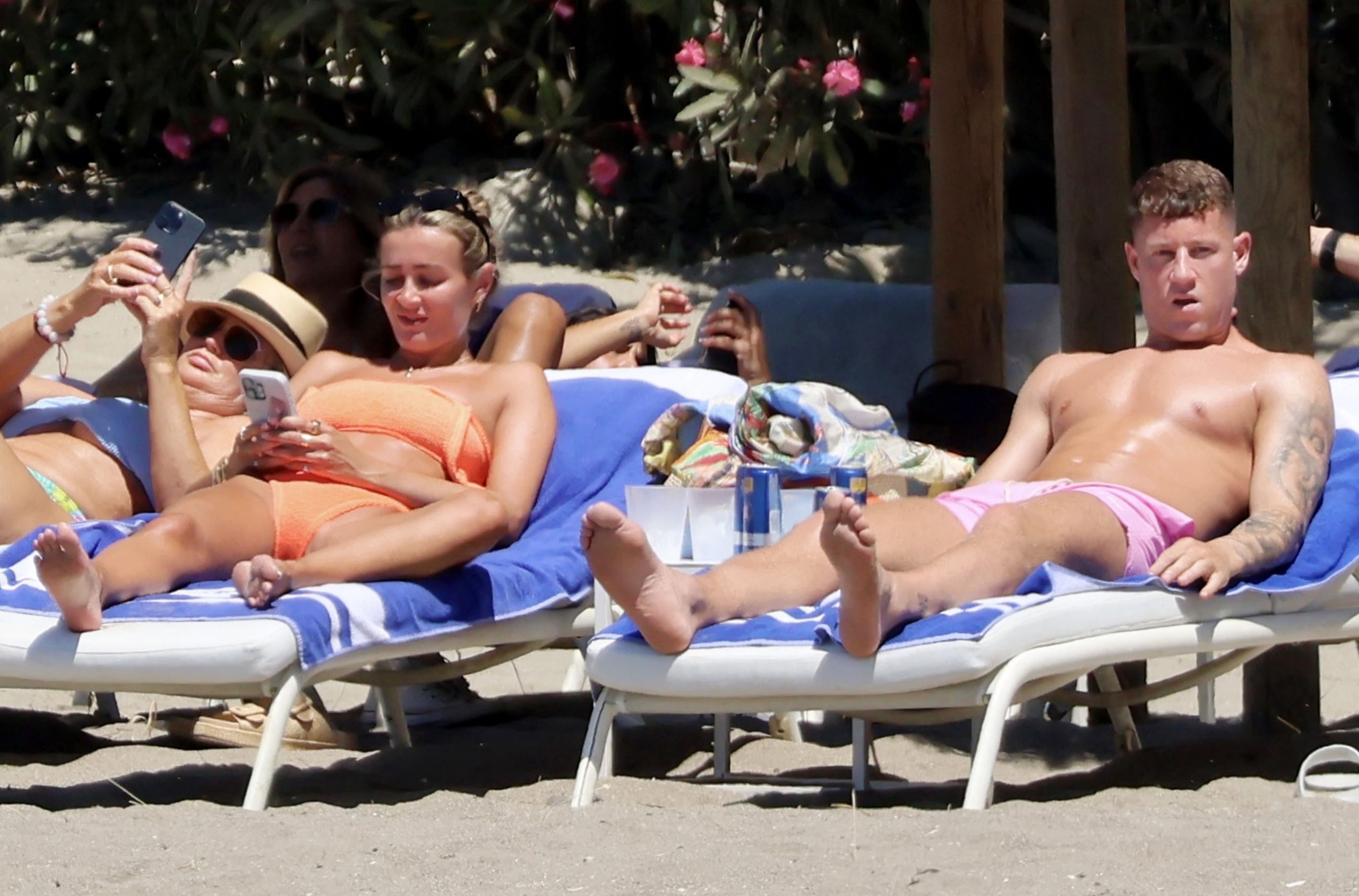 Ross Barkley relaxes on beach with bikini-clad girlfriend Katherine as he closes in on Aston Villa transfer