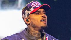 Chris Brown freed on £5m bail by London court