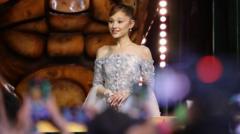 Man who grabbed Ariana Grande in Singapore charged by police