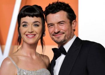 Orlando Bloom strikes pose with ex Katy Perry lookalike