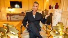 Robbie Williams breaks The Beatles’ chart record