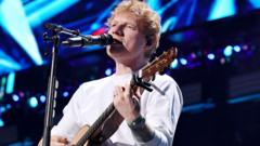 Stadium owner Robert Kraft says Ed Sheeran asked him to donate m in aid after Macklemore backlash