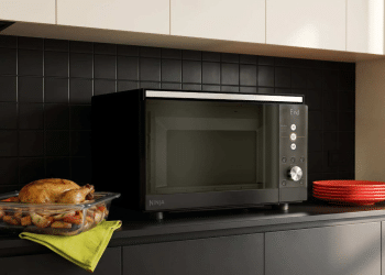 The new Ninja Crispi Microwave cooks and crisps enough food for 8 people — and it might make you want to to pull the plug on your full-sized oven